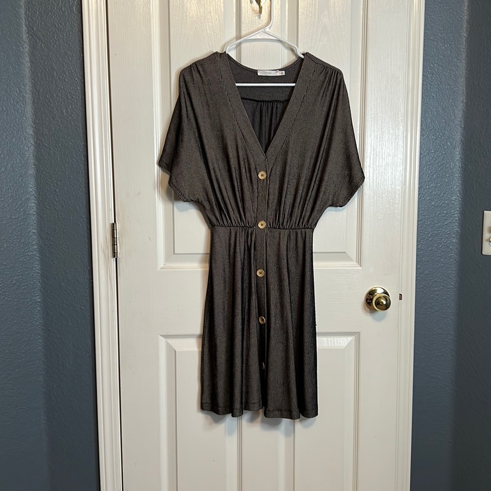 V-neck, blousey dress with wood-like buttons